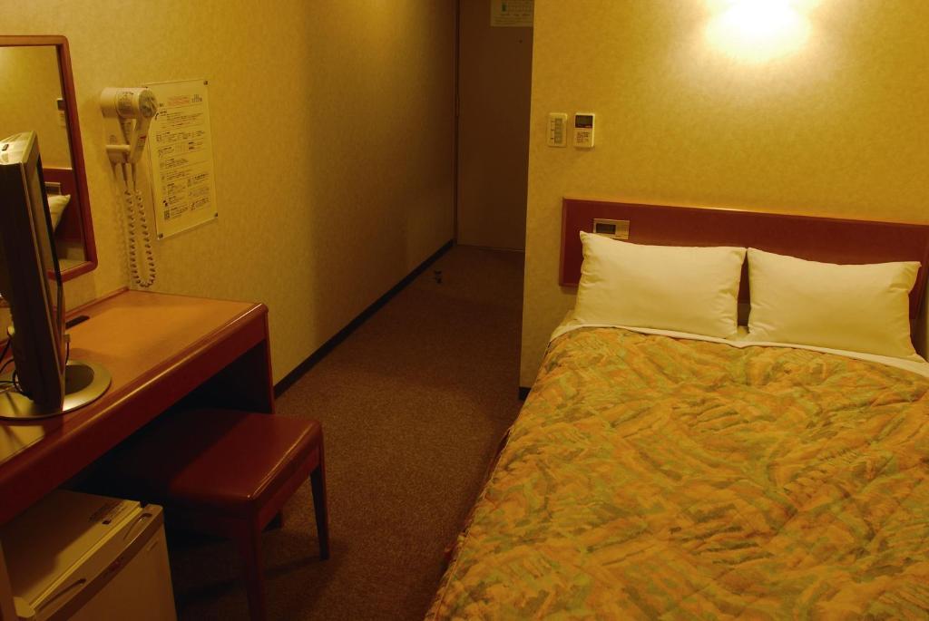 Hotel New Budget Muroran Pokoj fotografie