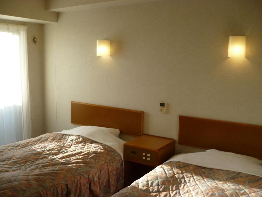 Hotel New Budget Muroran Pokoj fotografie