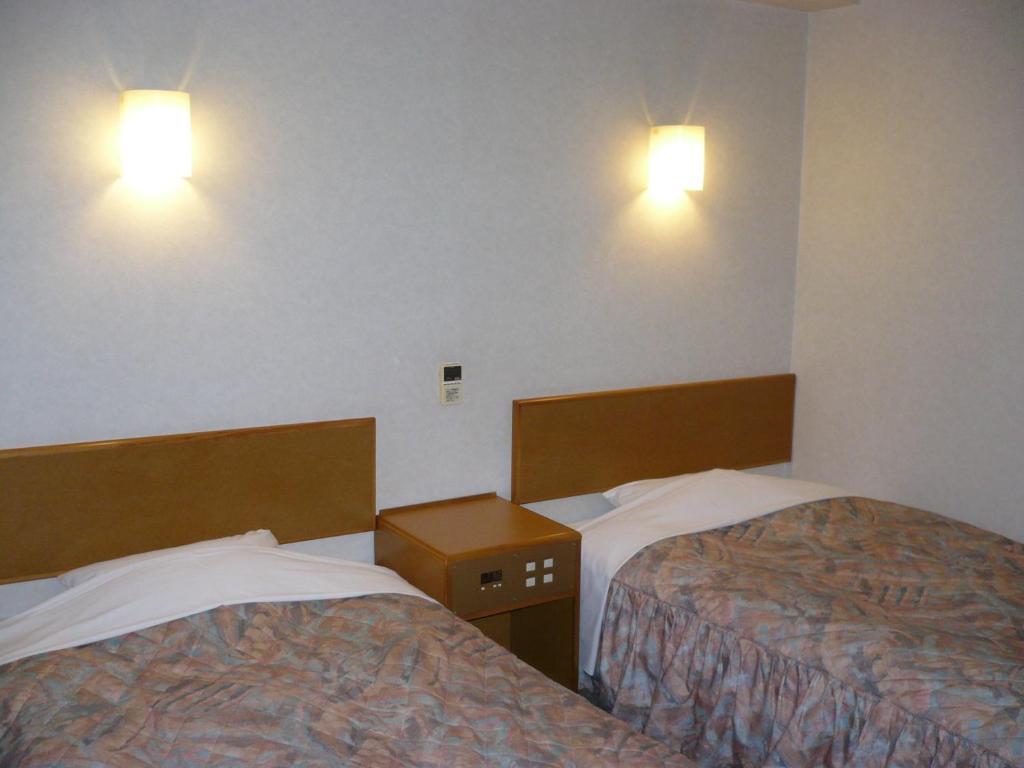 Hotel New Budget Muroran Pokoj fotografie