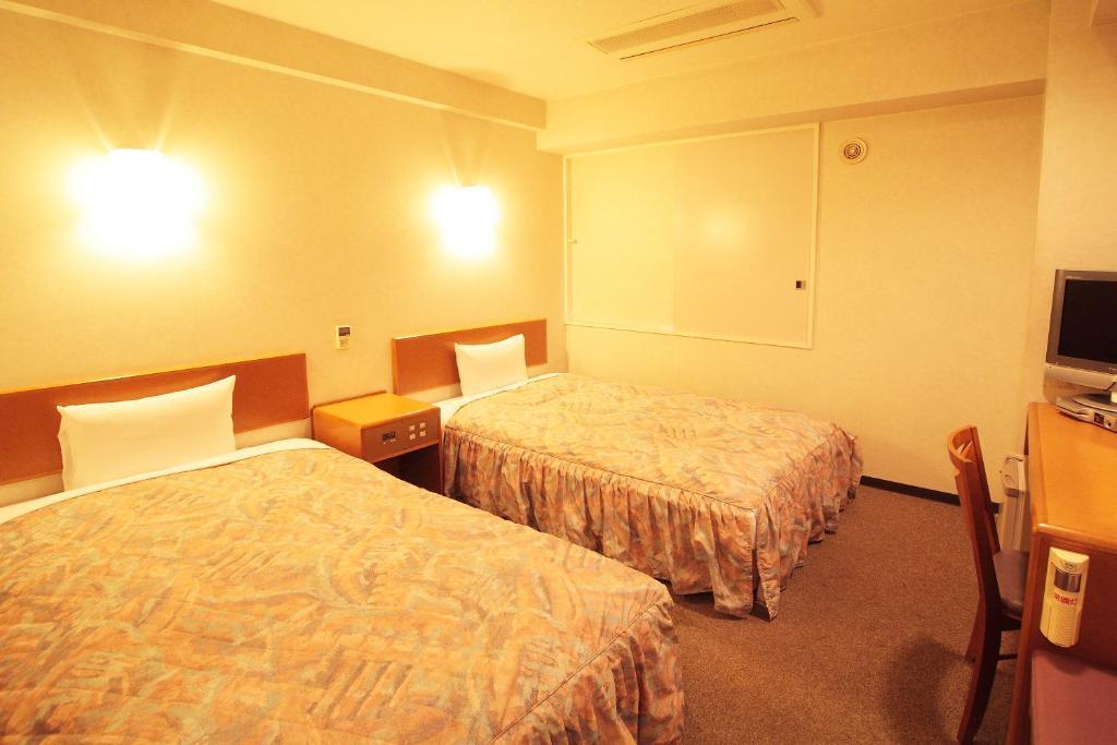 Hotel New Budget Muroran Pokoj fotografie